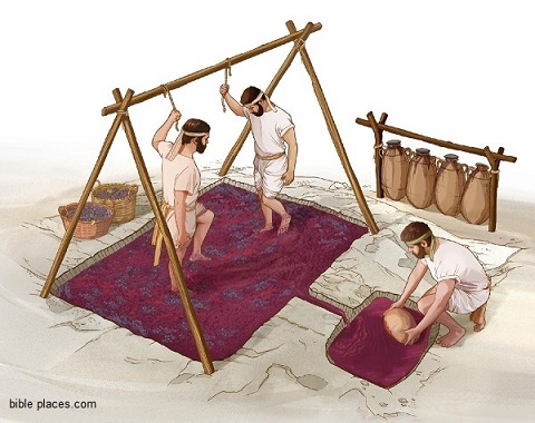 Pessoas pisando uvas no lagar lagar na Antiguidade